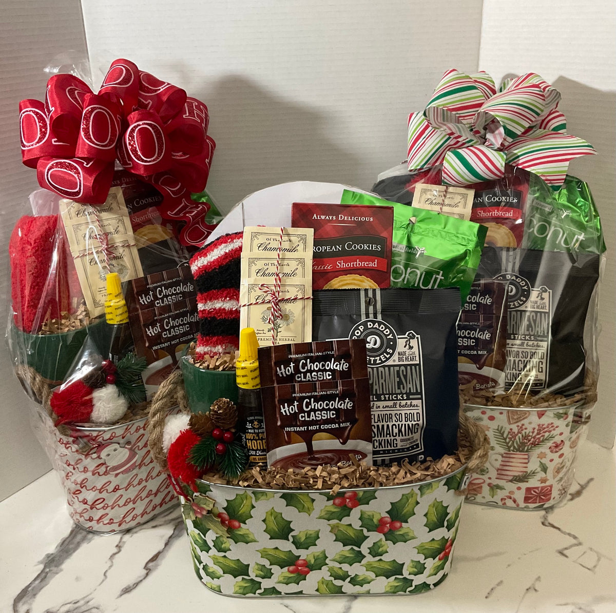 Three Holiday Comfort Gift designs; each sold separately