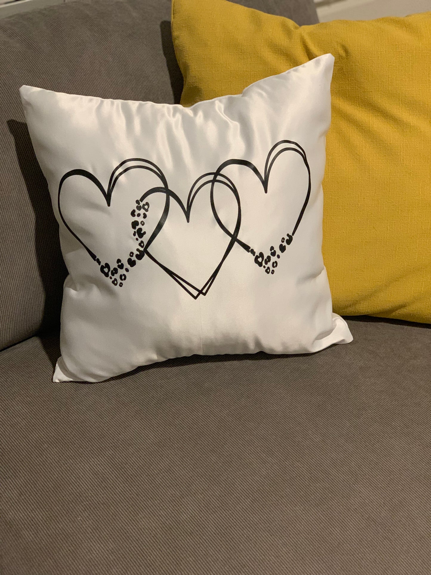 Three interlocking heart pillow